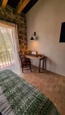 Cama o camas de una habitación en Hotel Casa Xaa