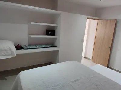 Cama o camas de una habitación en Naranja Departamento 33 M2 nuevo