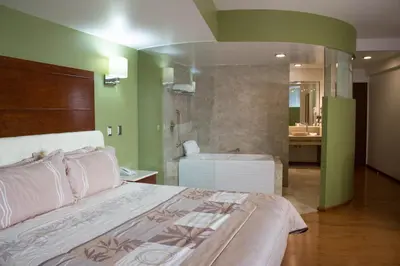 Cama o camas de una habitación en Hotel Malinalli
