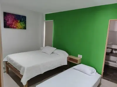 Cama o camas de una habitación en Verde Departamento 33 M2 Nuevo