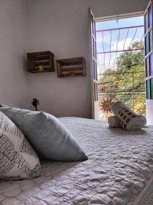 Cama o camas de una habitación en Mi Atardecer en Tepoz, Hostal