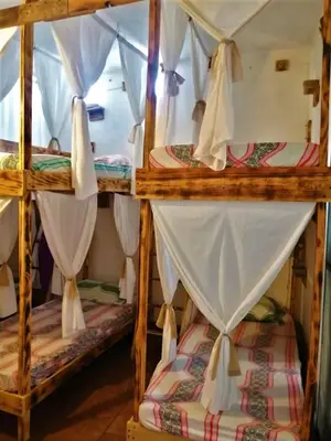 Cama o camas de una habitación en Mi Atardecer en Tepoz, Hostal