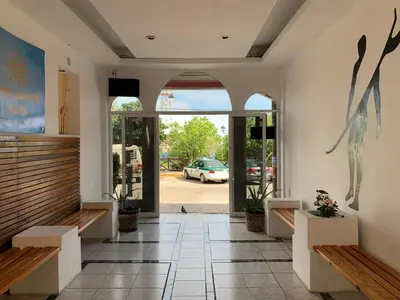 Una televisión o centro de entretenimiento en Hotel Casa Juanita