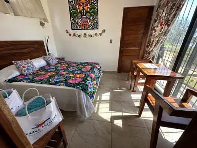 Cama o camas de una habitación en Beachfront Paradise Boutique Hotel - Breeze Room I