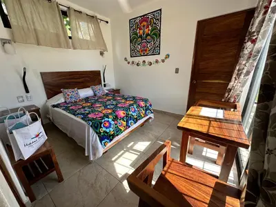 Cama o camas de una habitación en Beachfront Paradise Boutique Hotel - Breeze Room I
