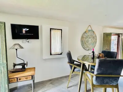 Una televisión o centro de entretenimiento en Loft Milán Valquirico
