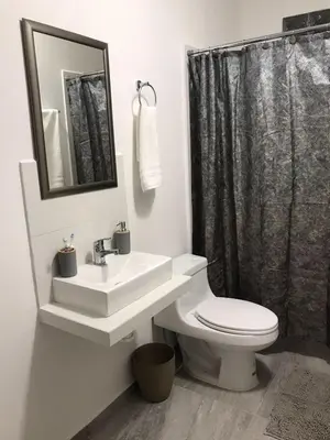 Un baño de Garden Suites Comalcalco