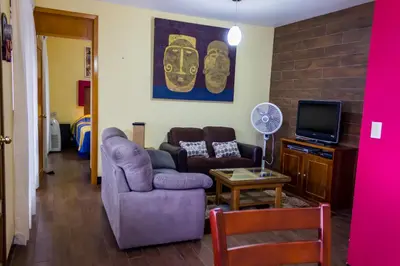Una televisión o centro de entretenimiento en Casa del Barrio Apartments Oaxaca
