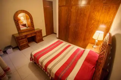 Cama o camas de una habitación en Casa del Barrio Apartments Oaxaca