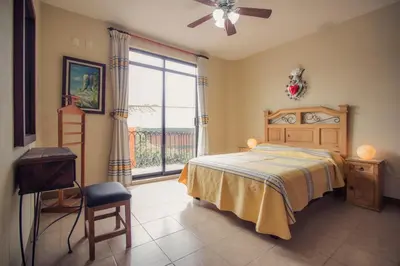Cama o camas de una habitación en Casa del Barrio Apartments Oaxaca