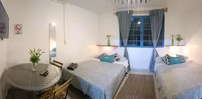 Cama o camas de una habitación en Oasis Airport