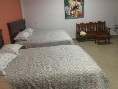 Cama o camas de una habitación en Casa alebrijes