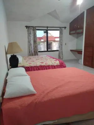 Cama o camas de una habitación en HERMOSA CASA EN CUERNAVACA: JARDÍN DEL LAGO