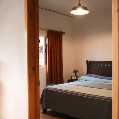 Cama o camas de una habitación en Hospedaje Casa Teotleco