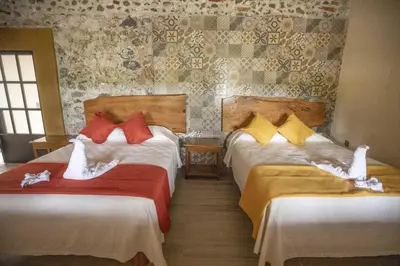 Cama o camas de una habitación en Hacienda Gamboa
