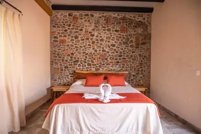 Cama o camas de una habitación en Hacienda Gamboa