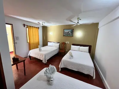 Cama o camas de una habitación en Hotel Doña Mary Huatulco