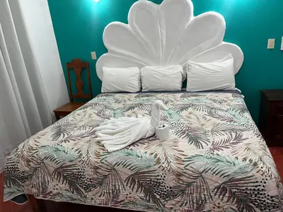 Cama o camas de una habitación en Hotel Doña Mary Huatulco