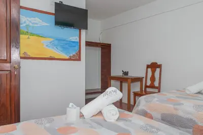 Cama o camas de una habitación en Hotel Doña Mary Huatulco