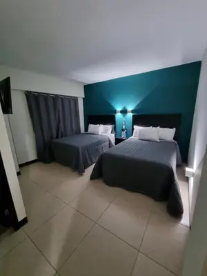 Cama o camas de una habitación en EMS Hoteles Centro Histórico