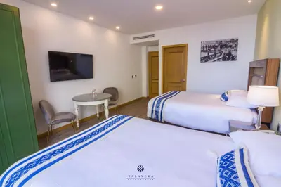 Cama o camas de una habitación en Hotel Talavera Teziutlan