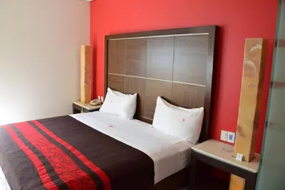 Cama o camas de una habitación en Plutarco Suites