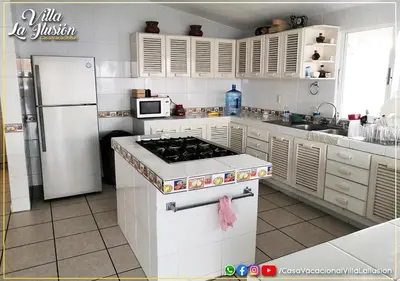 Una cocina o zona de cocina en Villa la Ilusión Casa Vacacional