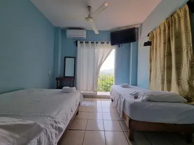 Cama o camas de una habitación en Casa La Paz 3