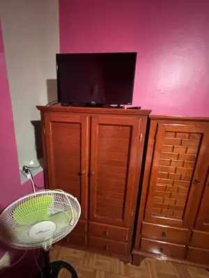 Una televisión o centro de entretenimiento en Hotel Posada 