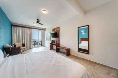Cama o camas de una habitación en Villas Coral Huatulco