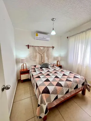 Cama o camas de una habitación en Departamento planta baja en Acapulco Diamante