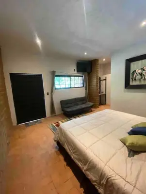 Cama o camas de una habitación en SUITE EL GUAYABO en Tepoztlán