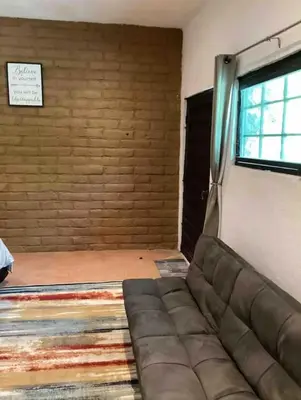 Zona de estar de SUITE EL GUAYABO en Tepoztlán