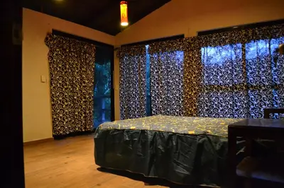 Cama o camas de una habitación en CABAÑA EL SALTO 2