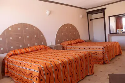 Cama o camas de una habitación en Hotel Plaza Sahagún