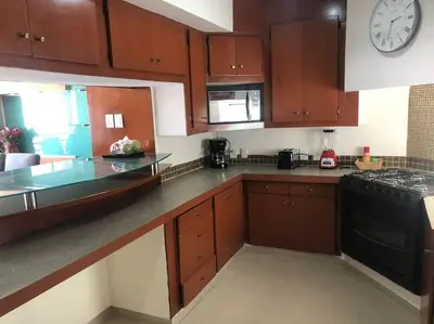 Una cocina o zona de cocina en 8pers -6camas AC -Alberca-Playa 3min Playas Vicente fox
