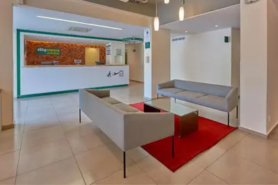 Zona de estar de City Express Junior by Marriott Puebla FINSA