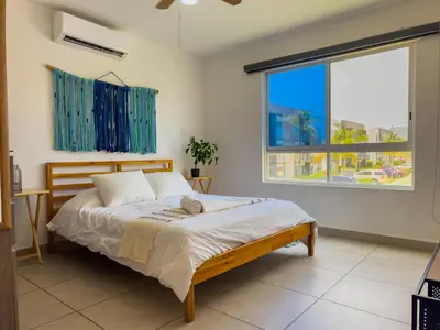 Cama o camas de una habitación en Beautiful Apartment in Dream Acapulco Diamante