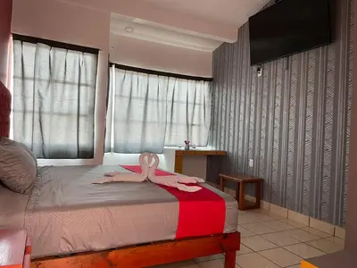 Cama o camas de una habitación en Hotel La Intimidad