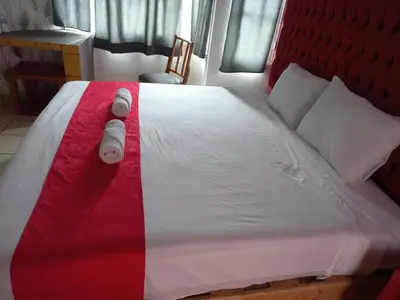 Cama o camas de una habitación en Hotel La Intimidad