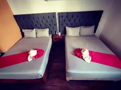 Cama o camas de una habitación en Hotel La Intimidad