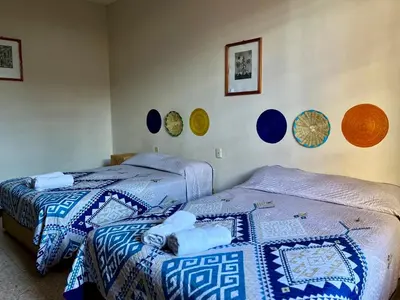 Cama o camas de una habitación en CASA CEMPOAL
