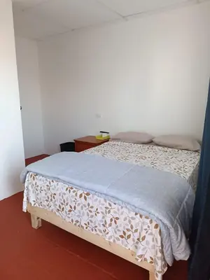 Cama o camas de una habitación en Hotel Posada Los Faroles Atlixco