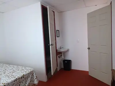 Cama o camas de una habitación en Hotel Posada Los Faroles Atlixco