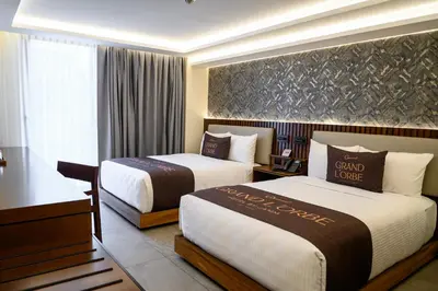 Cama o camas de una habitación en Hotel Grand L'Orbe by JAMM