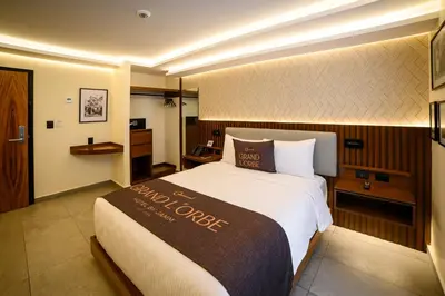 Cama o camas de una habitación en Hotel Grand L'Orbe by JAMM