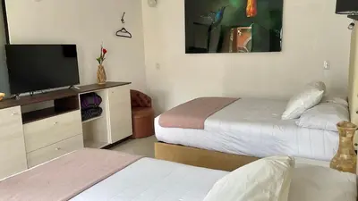 Cama o camas de una habitación en Hotel RioMiel Tlaxcala