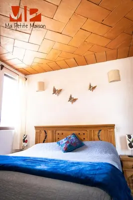 Cama o camas de una habitación en Ma Petite Maison