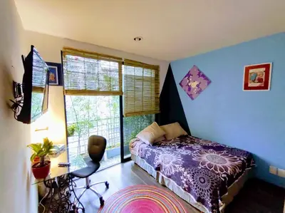 Cama o camas de una habitación en Departamento COMPARTIDO en el Corazón de la Ciudad