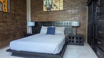 Cama o camas de una habitación en La Cabaña